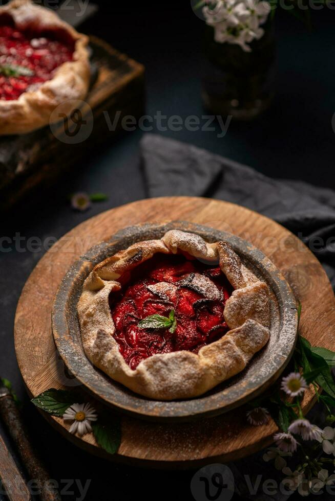 Delicious fresh sweet homemade rustic style strawberry tart photo