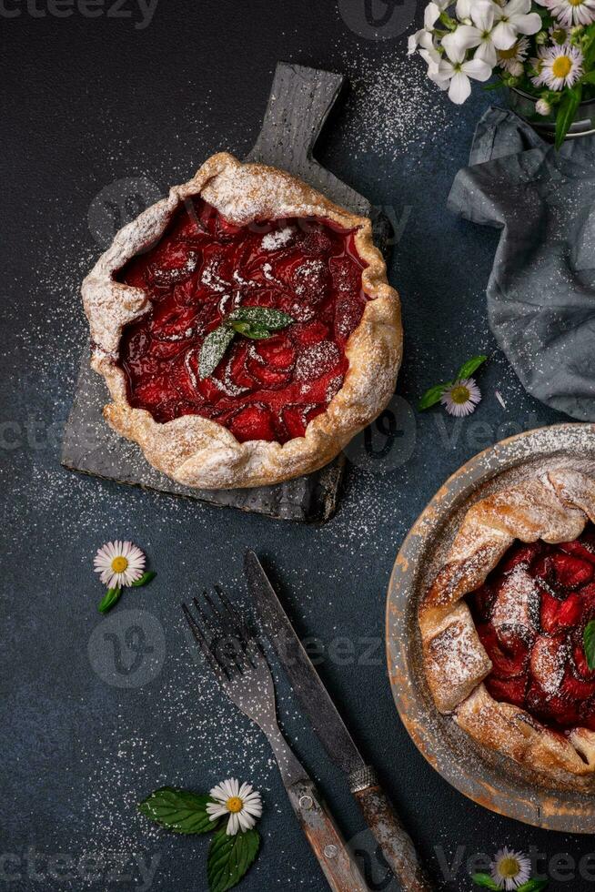 Delicious fresh sweet homemade rustic style strawberry tart photo