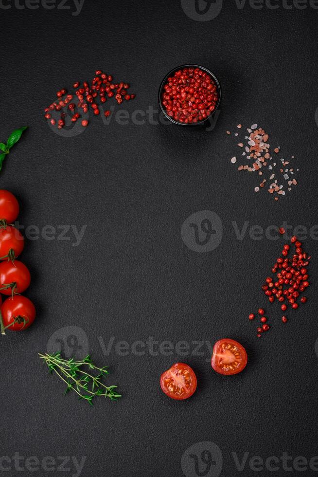 Ingredients for cooking cherry tomatoes, salt, spices and herbs photo