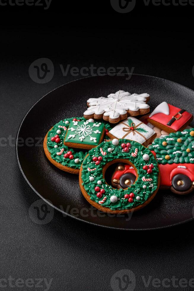 Delicious fresh colorful Christmas or New Year gingerbread cookies photo