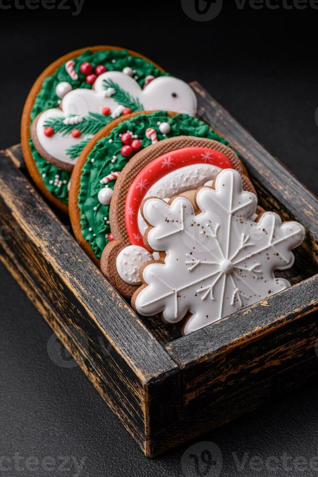 Delicious fresh colorful Christmas or New Year gingerbread cookies photo