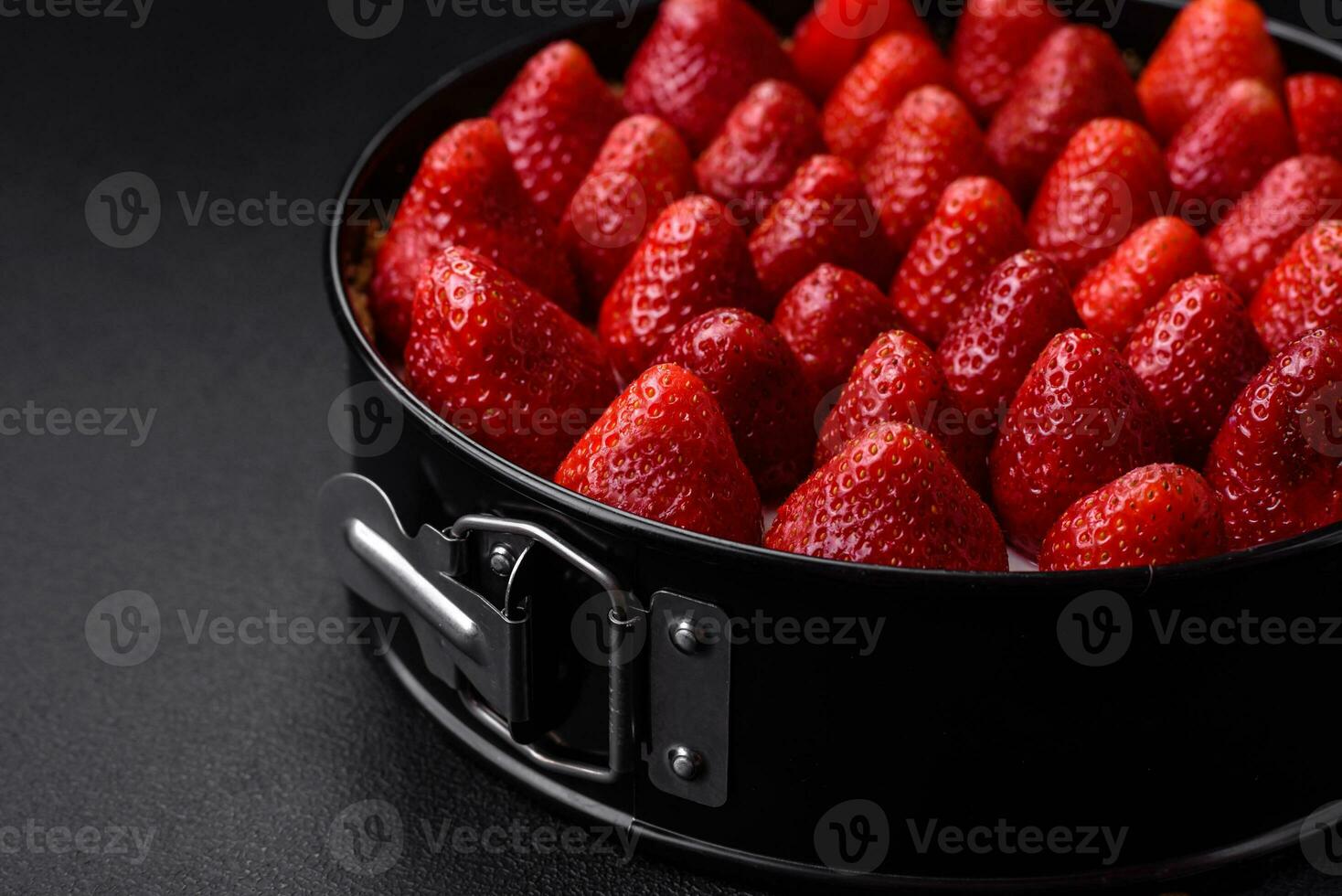Delicious sweet cake or cheesecake with mascarpone cheese and strawberries photo