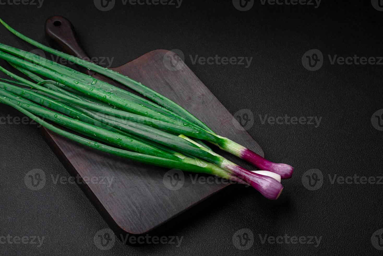 Fresh green onions for cooking a healthy vegetarian dish photo