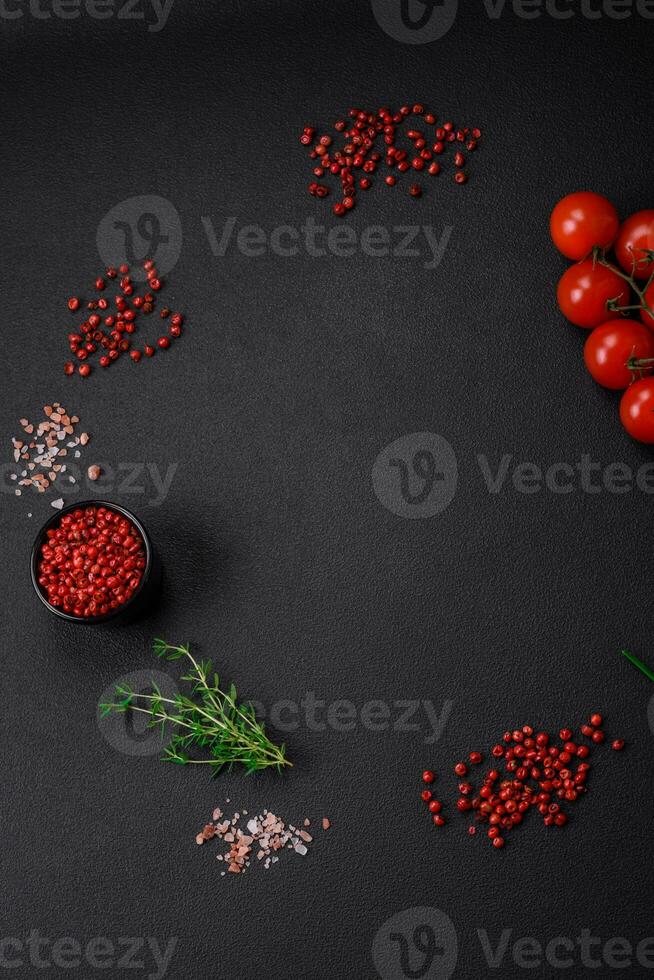 Ingredients for cooking cherry tomatoes, salt, spices and herbs photo