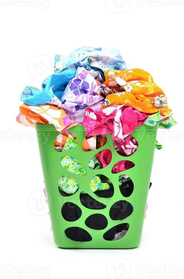 unwashed cloth in basket photo