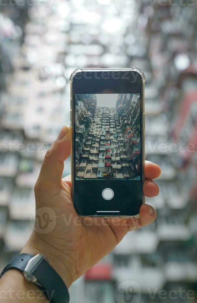 Take Photo with Yick Fat Building, Quarry Bay, Hong Kong. Residential area in old apartment