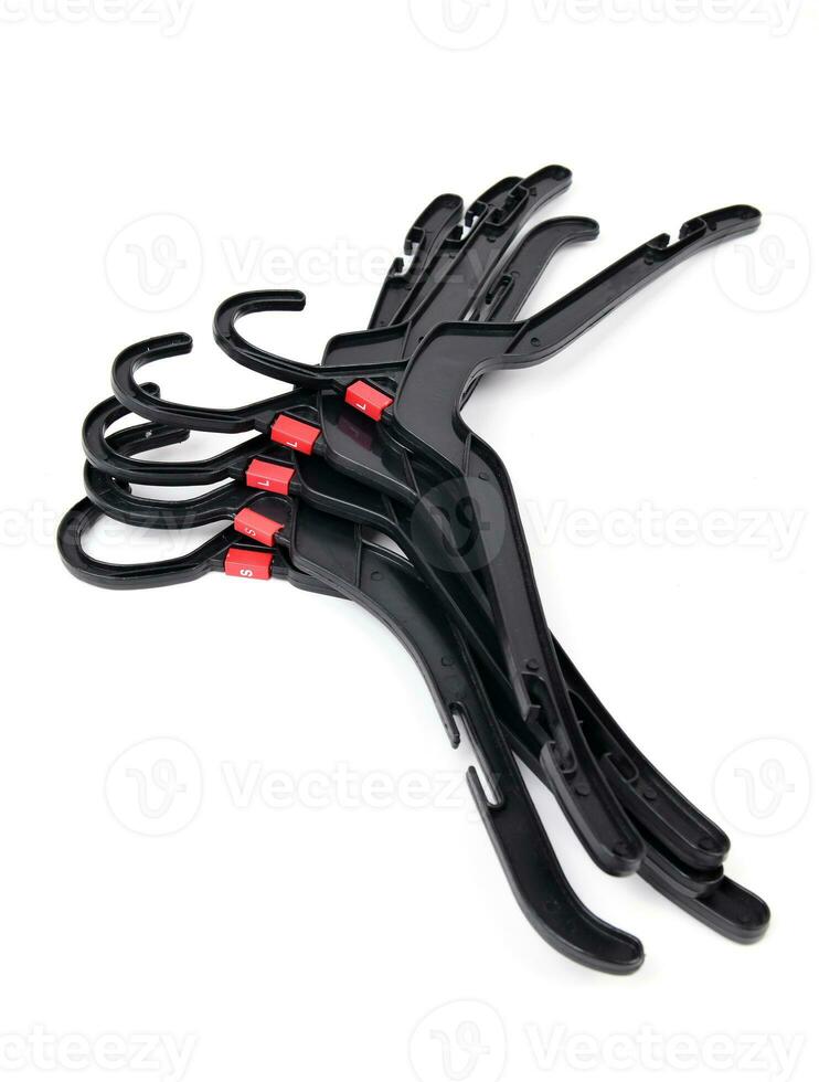 black plastic clothes hanger photo