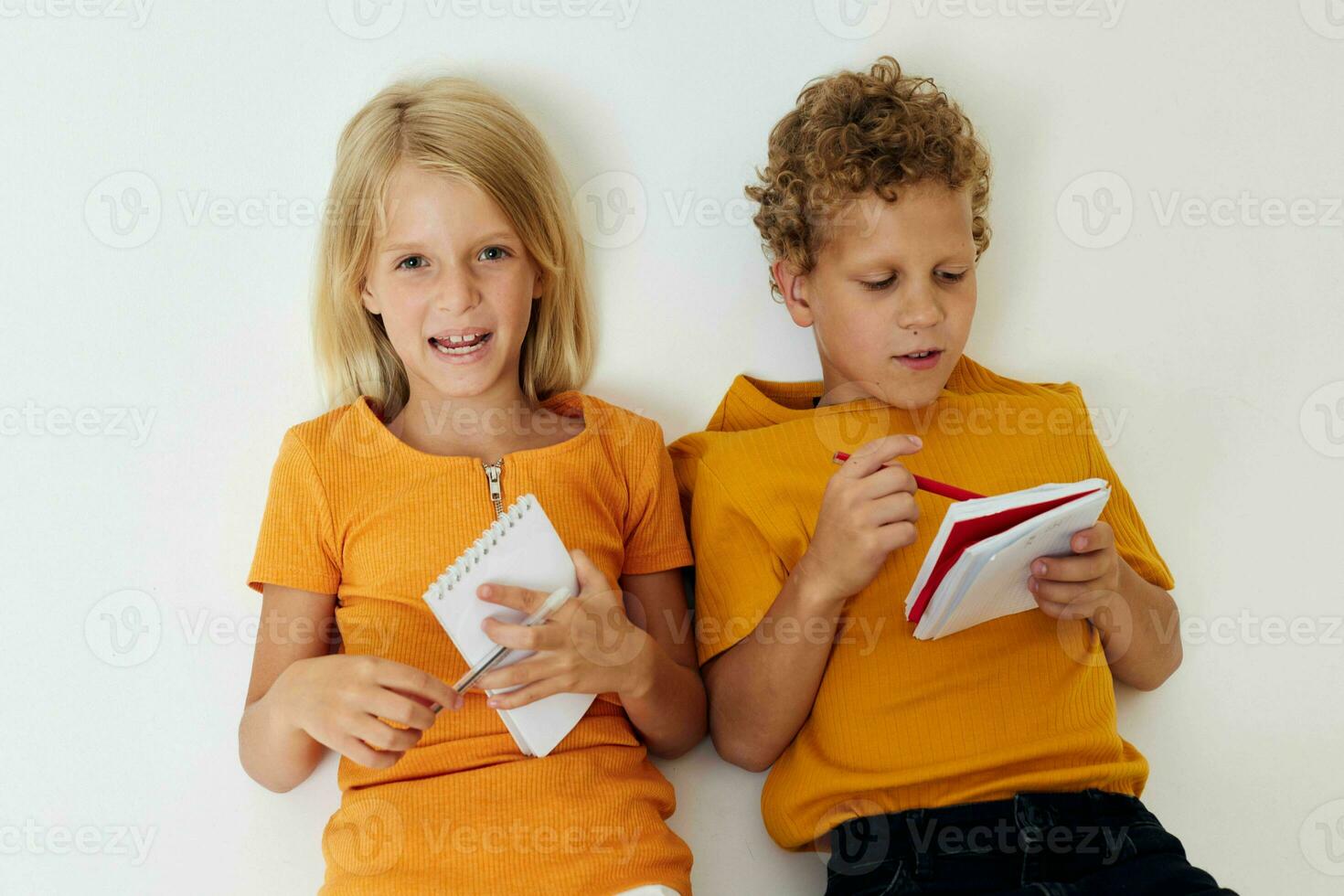 picture of positive boy and girl childhood entertainment drawing childhood lifestyle unaltered photo