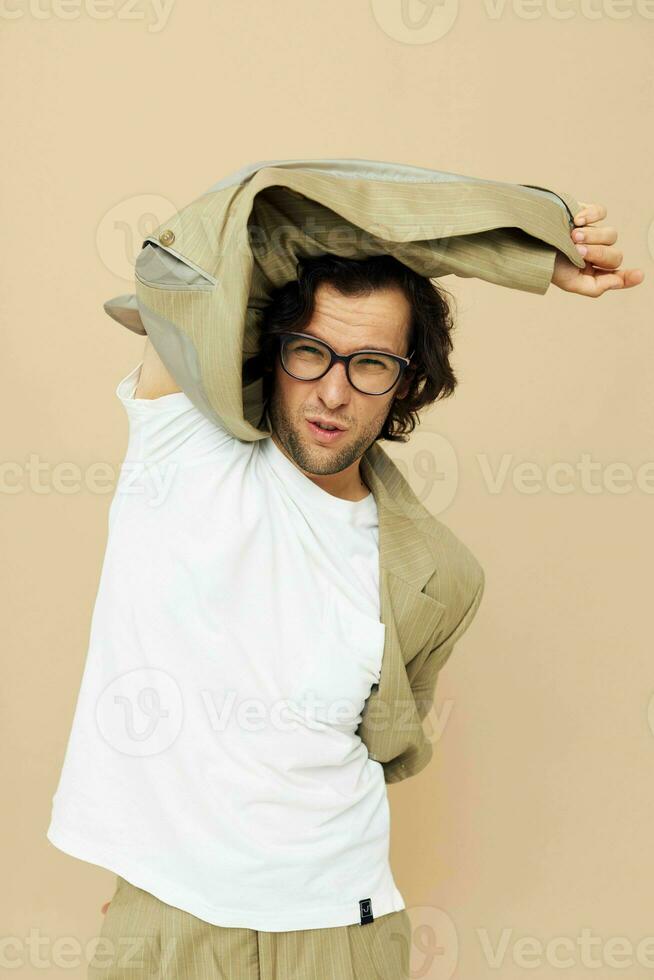 man spectacled beige suit elegant style isolated background photo