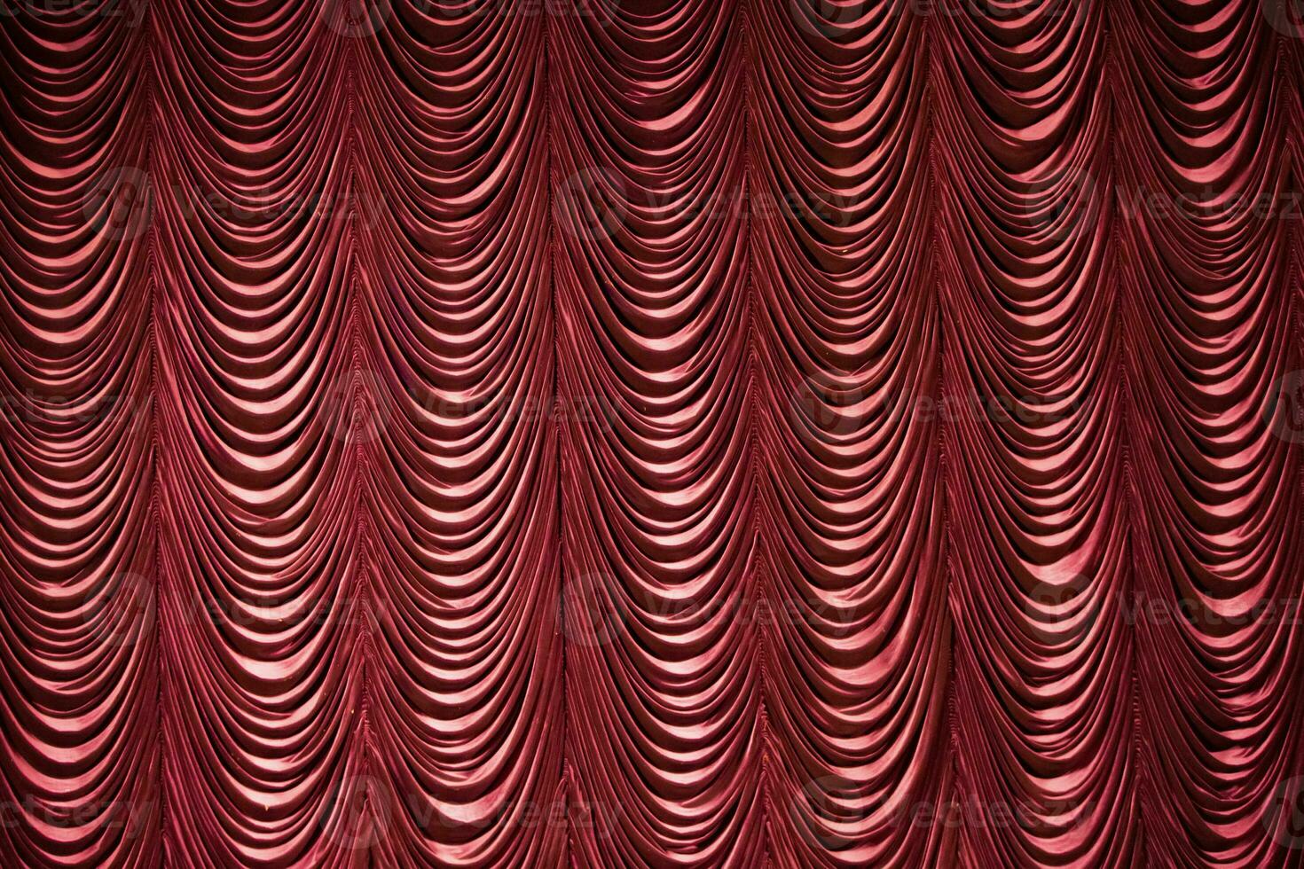 Stage classic burgundy curtains. Theatrical background. photo
