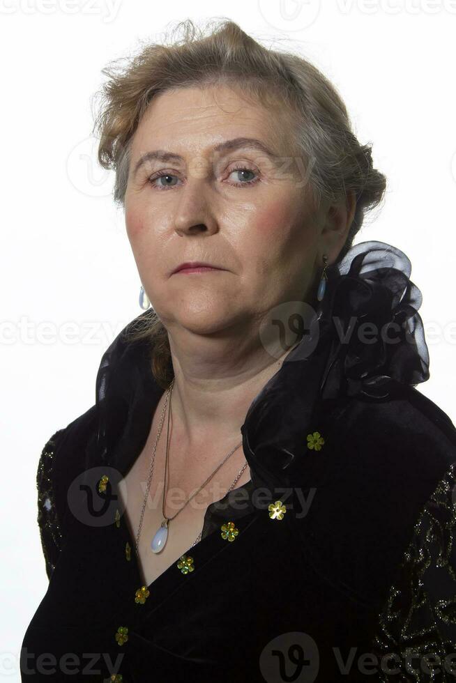 Elderly ugly woman with an evil face. photo