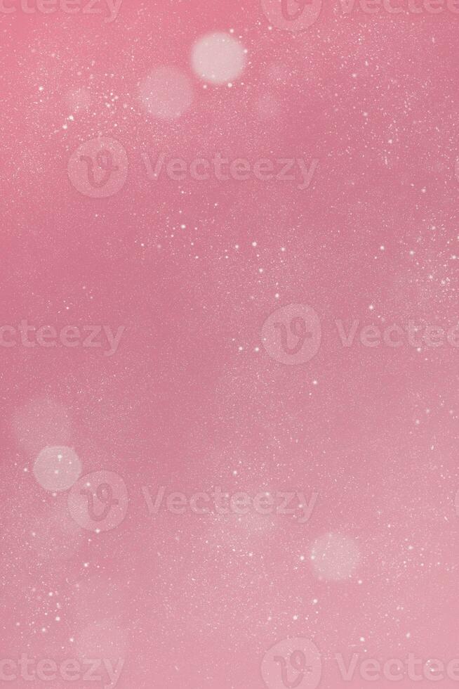 Vertical Christmas pink background with snowflakes and white bokeh. photo