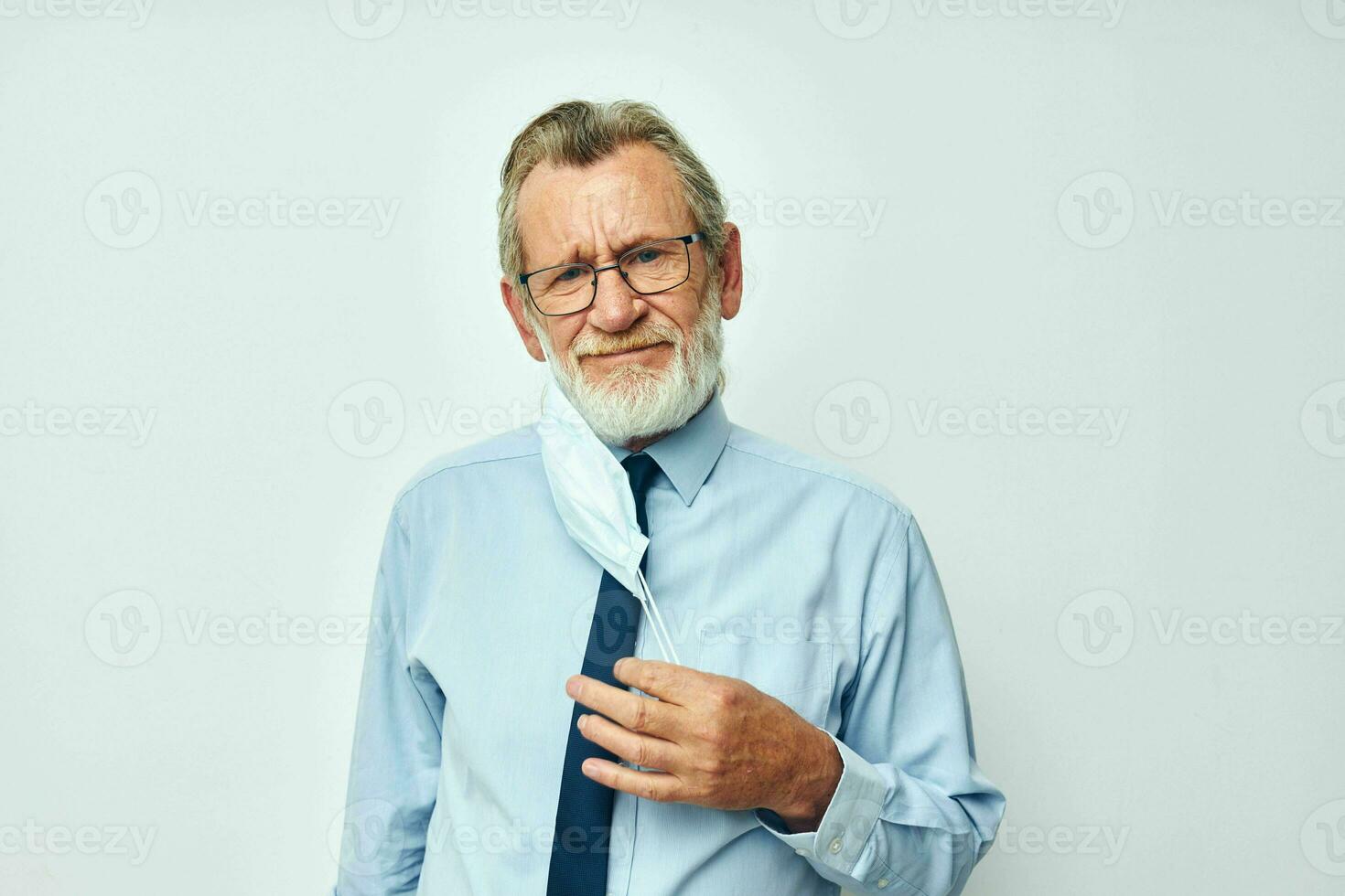 Senior man with face mask photo