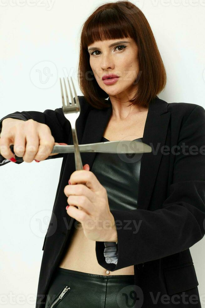 photo pretty woman knife and fork in hands emotions posing isolated background