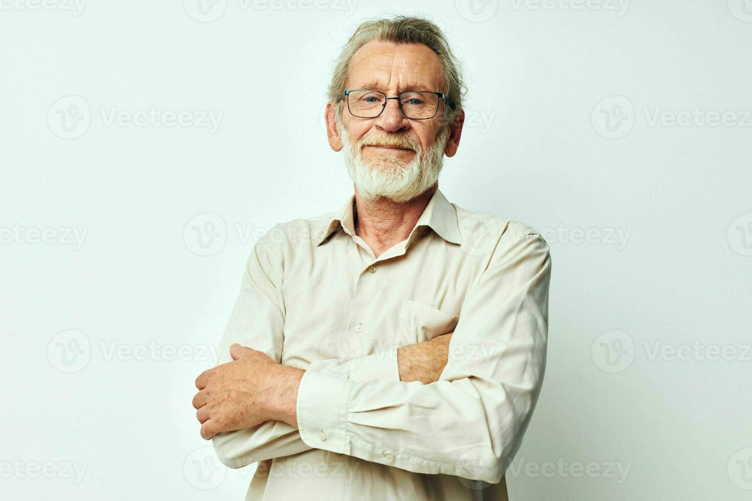 Photo of retired old man with a gray beard in a shirt and glasses unaltered