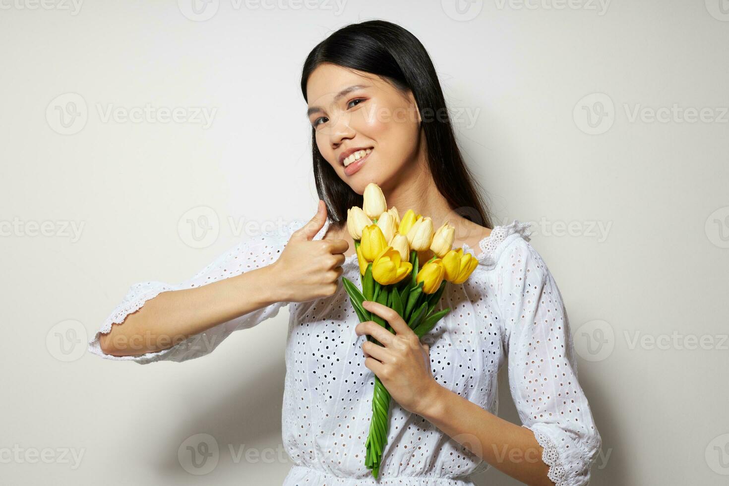 woman in a white shirt flowers spring posing studio model unaltered photo