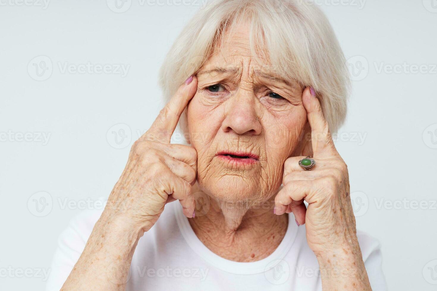Photo of retired old lady vision problems myopia light background