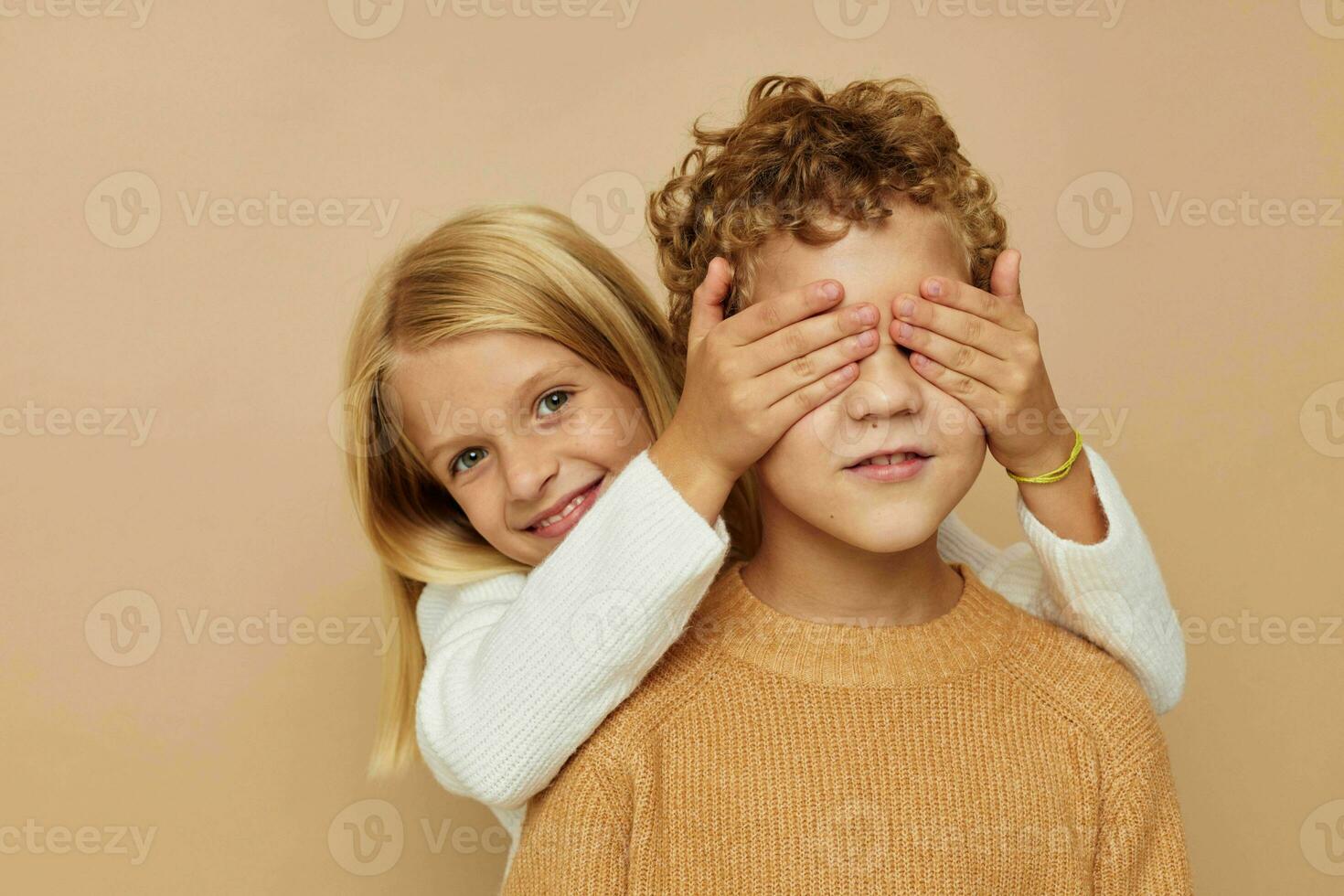 Portrait of cute children hug entertainment posing friendship isolated background photo