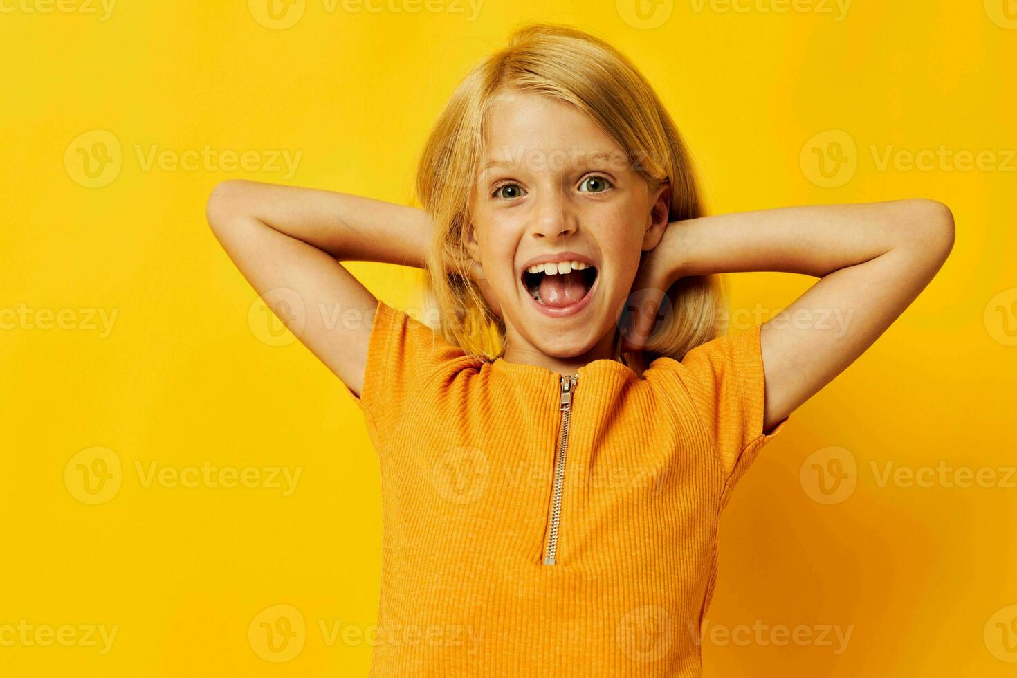 beautiful little girl blonde straight hair posing smile fun childhood lifestyle unaltered photo