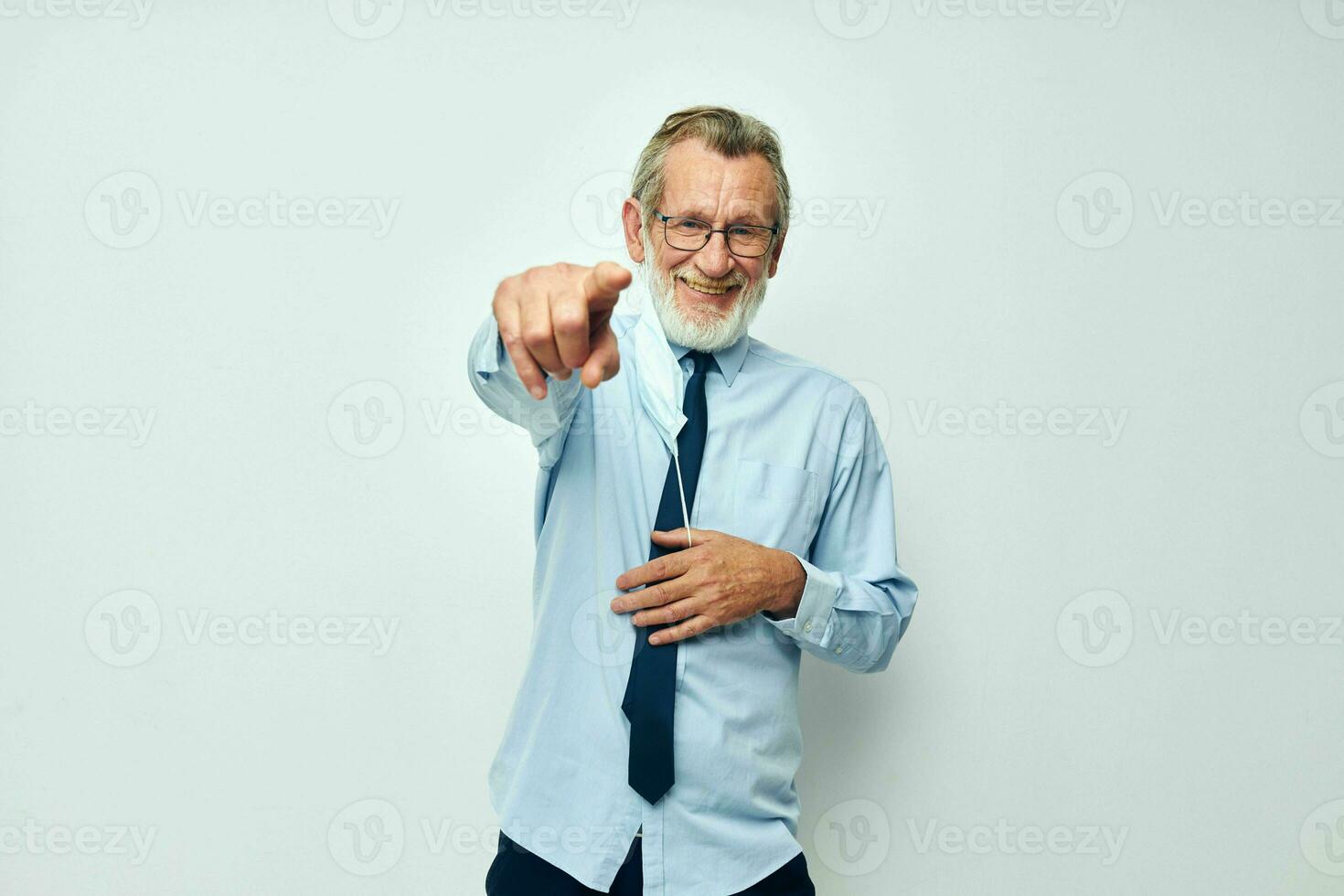 Portrait of happy senior man medical mask protection isolated background photo