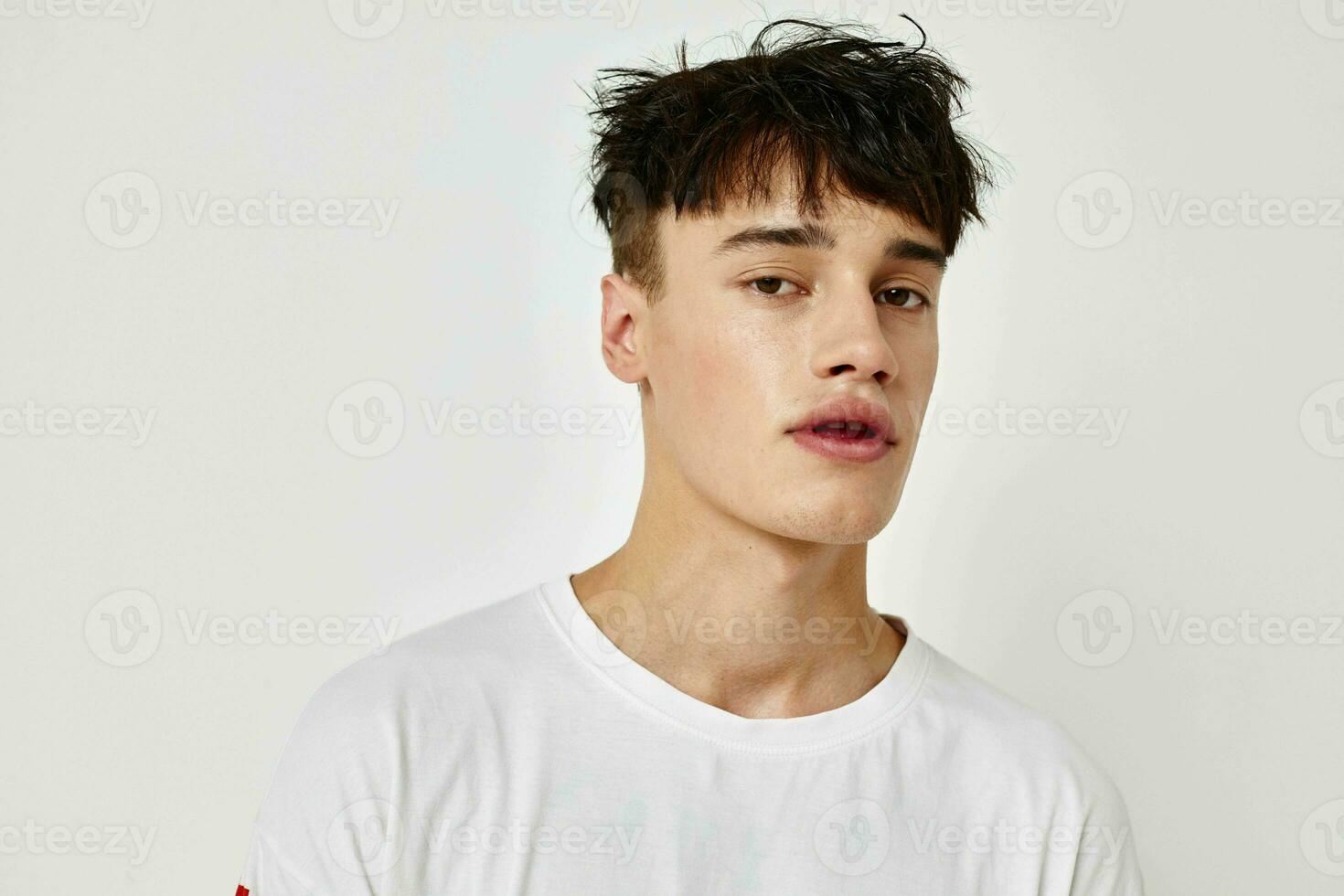 Man posing fashion youth style emotions light background unaltered photo