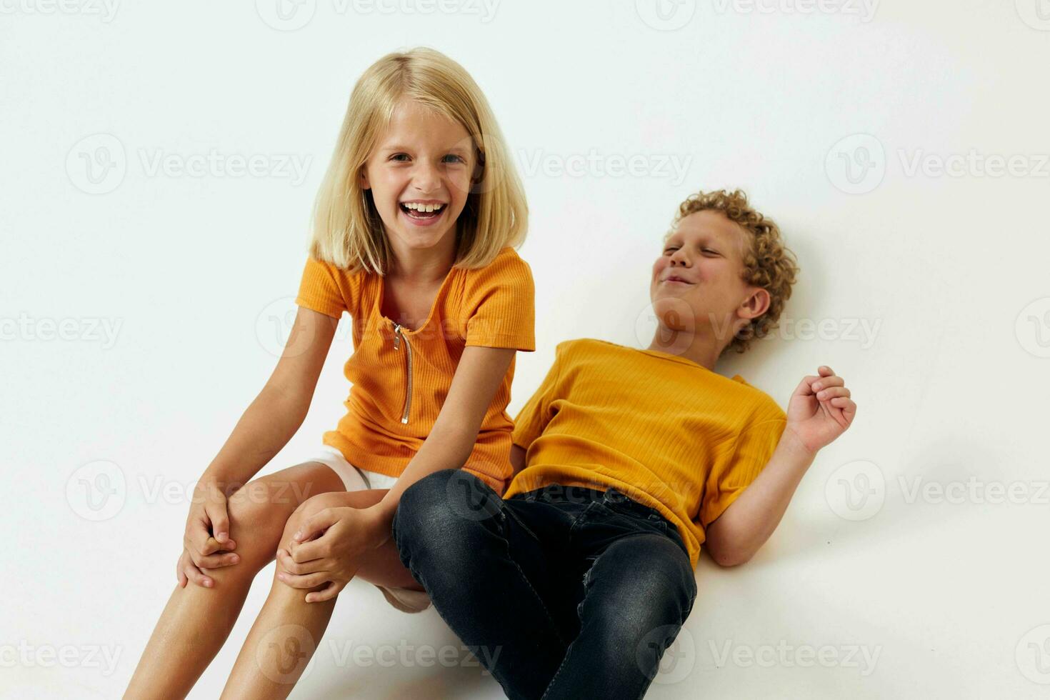 cheerful children casual wear games fun together posing emotions quarrel isolated background unaltered photo