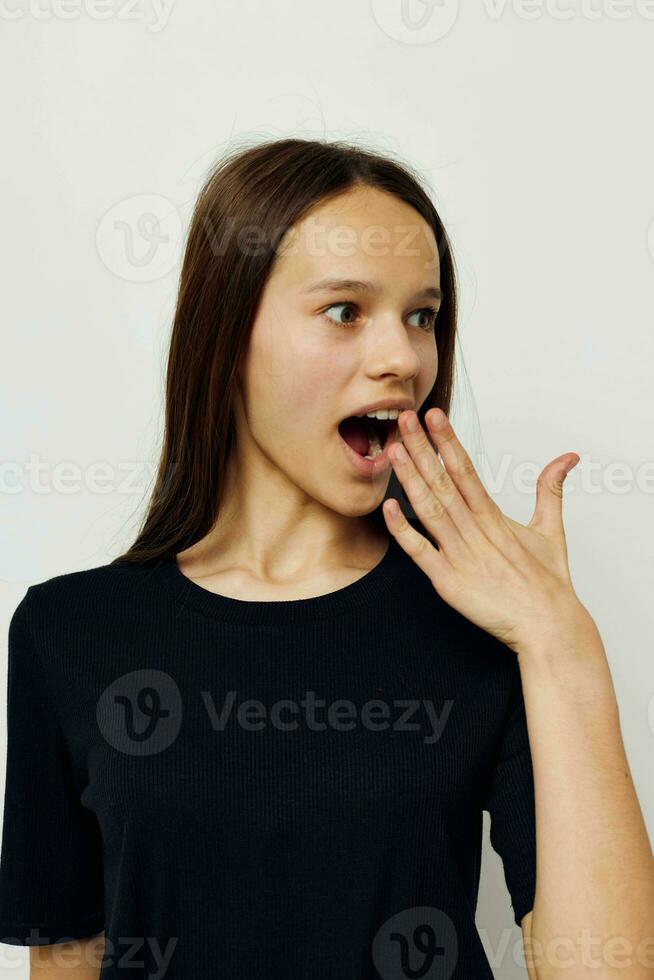 young woman in black pants and a T-shirt fashion Lifestyle unaltered photo