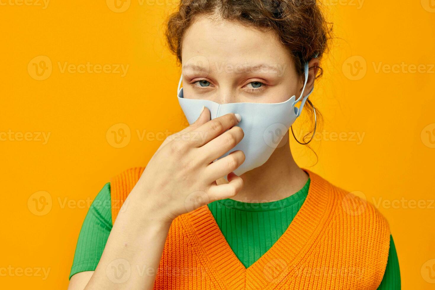 funny girl protective medical mask fun posing fashion isolated backgrounds unaltered photo
