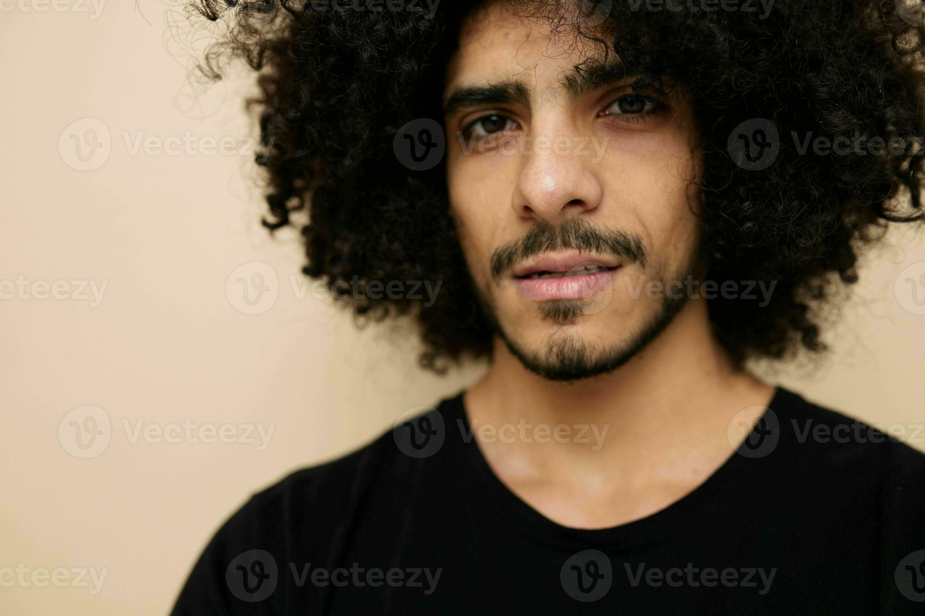a man with a lush hairstyle stylish hairstyle casual wear Lifestyle