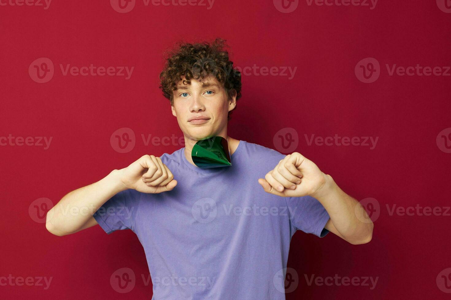 cute guy in purple t-shirt hat birthday party fun photo