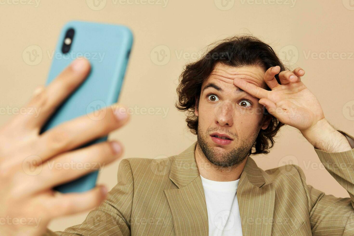 handsome man takes a selfie classic style technologies isolated background photo