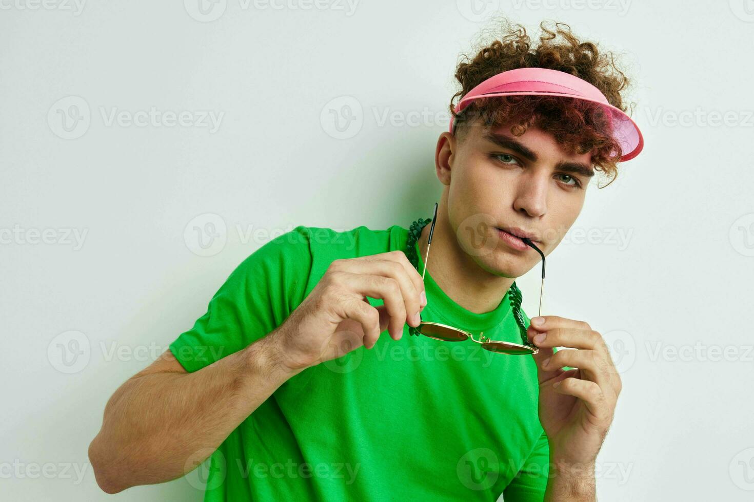 kinky guy green t-shirt decoration fashion glasses isolated background photo