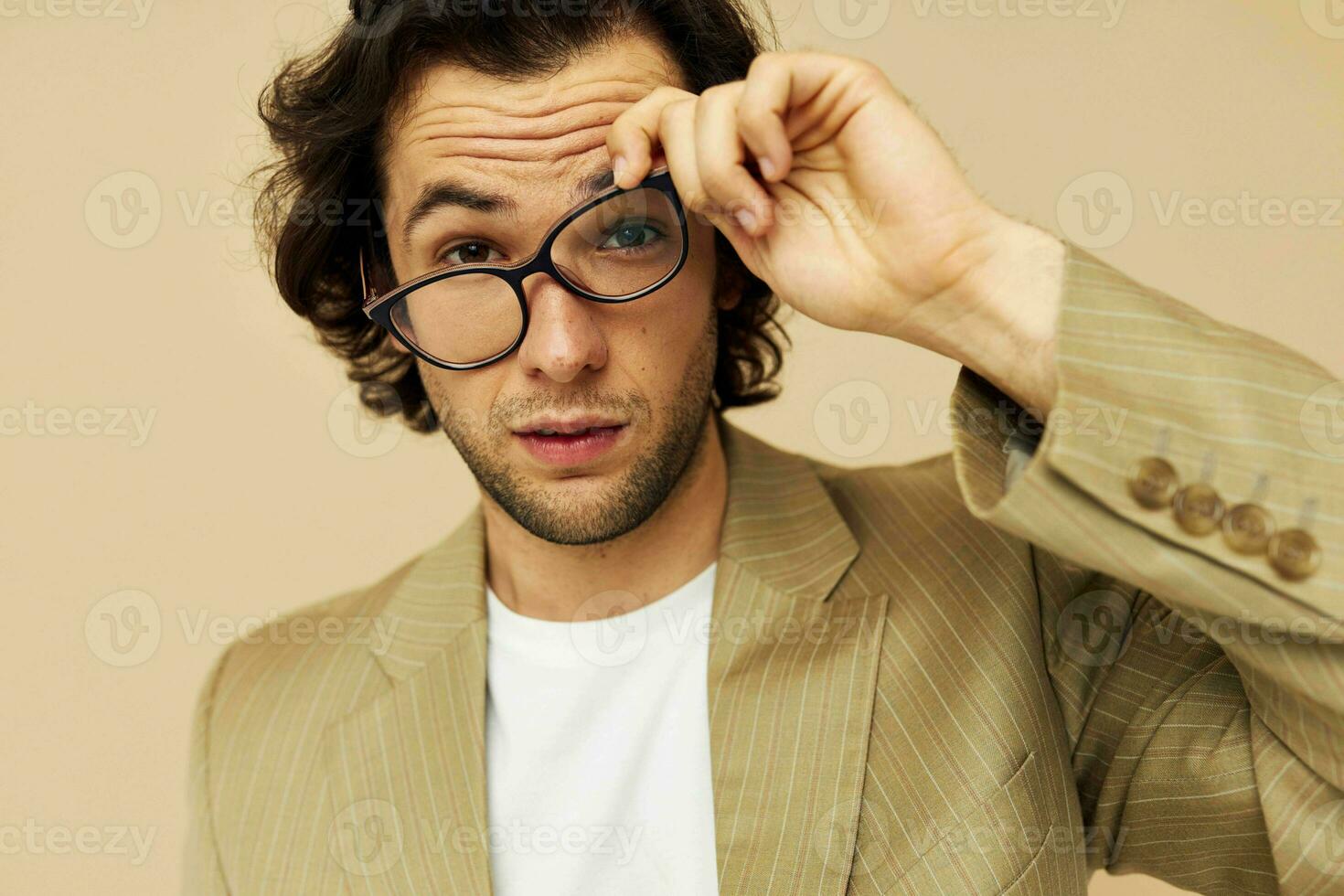 Cheerful man in a suit posing emotions wear glasses Lifestyle unaltered photo