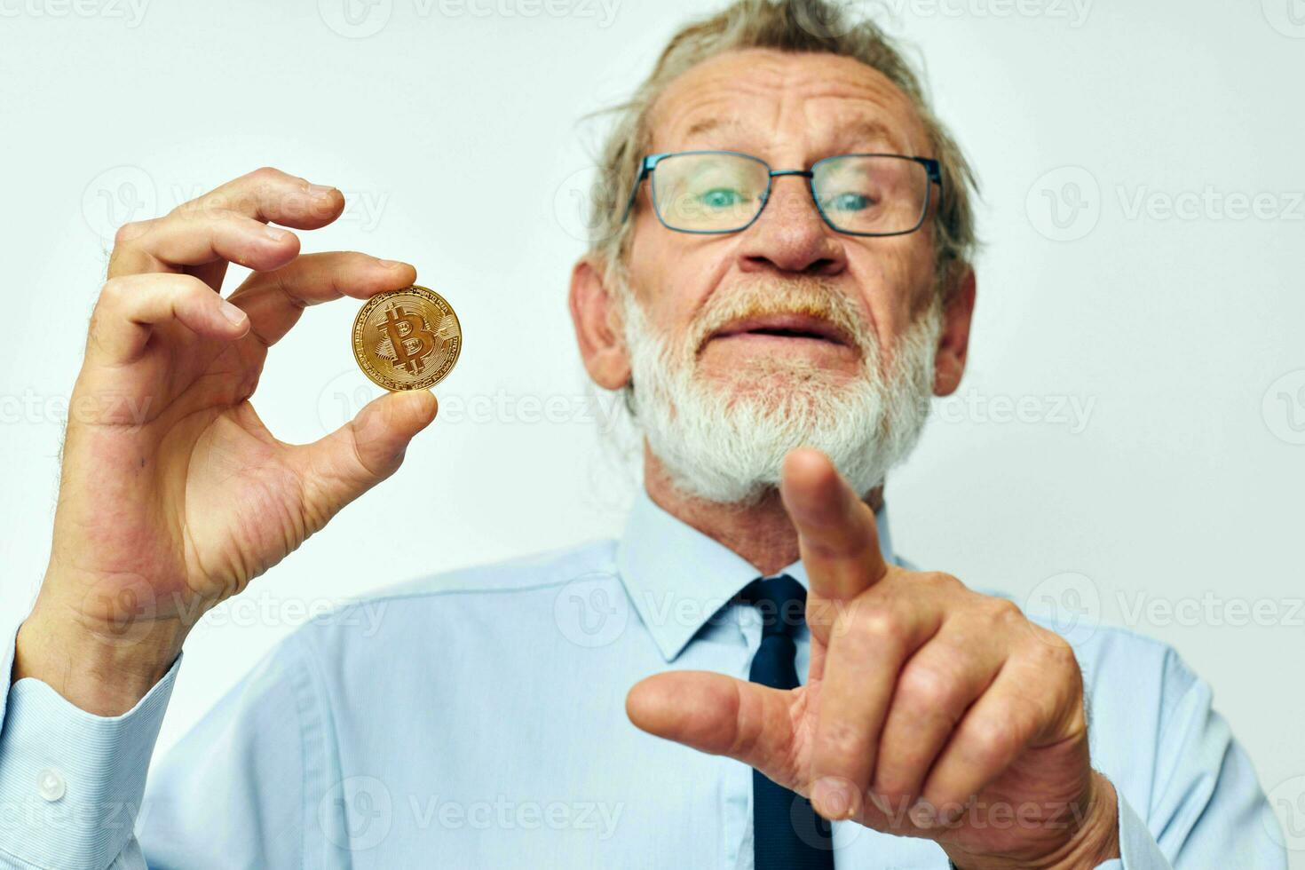 Photo of retired old man in a shirt with a tie Finance and Investments Bitcoin cropped view
