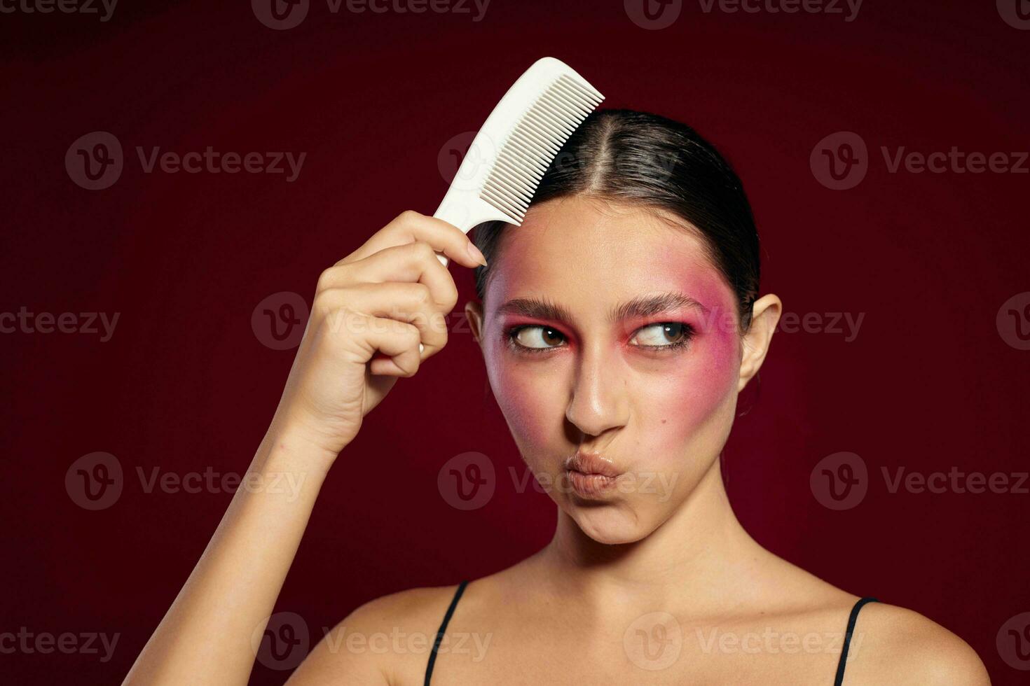 woman combing hair hairstyle care close-up photo