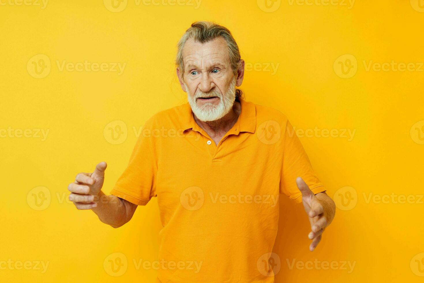 Photo of retired old man with a gray beard emotion gestures hands isolated background