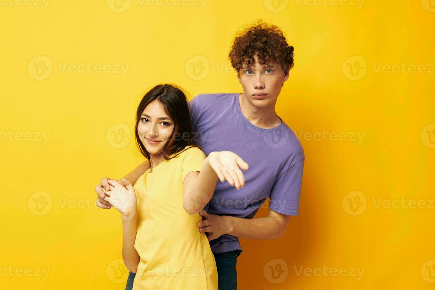 young boy and girl casual clothes posing emotions antics isolated background unaltered photo