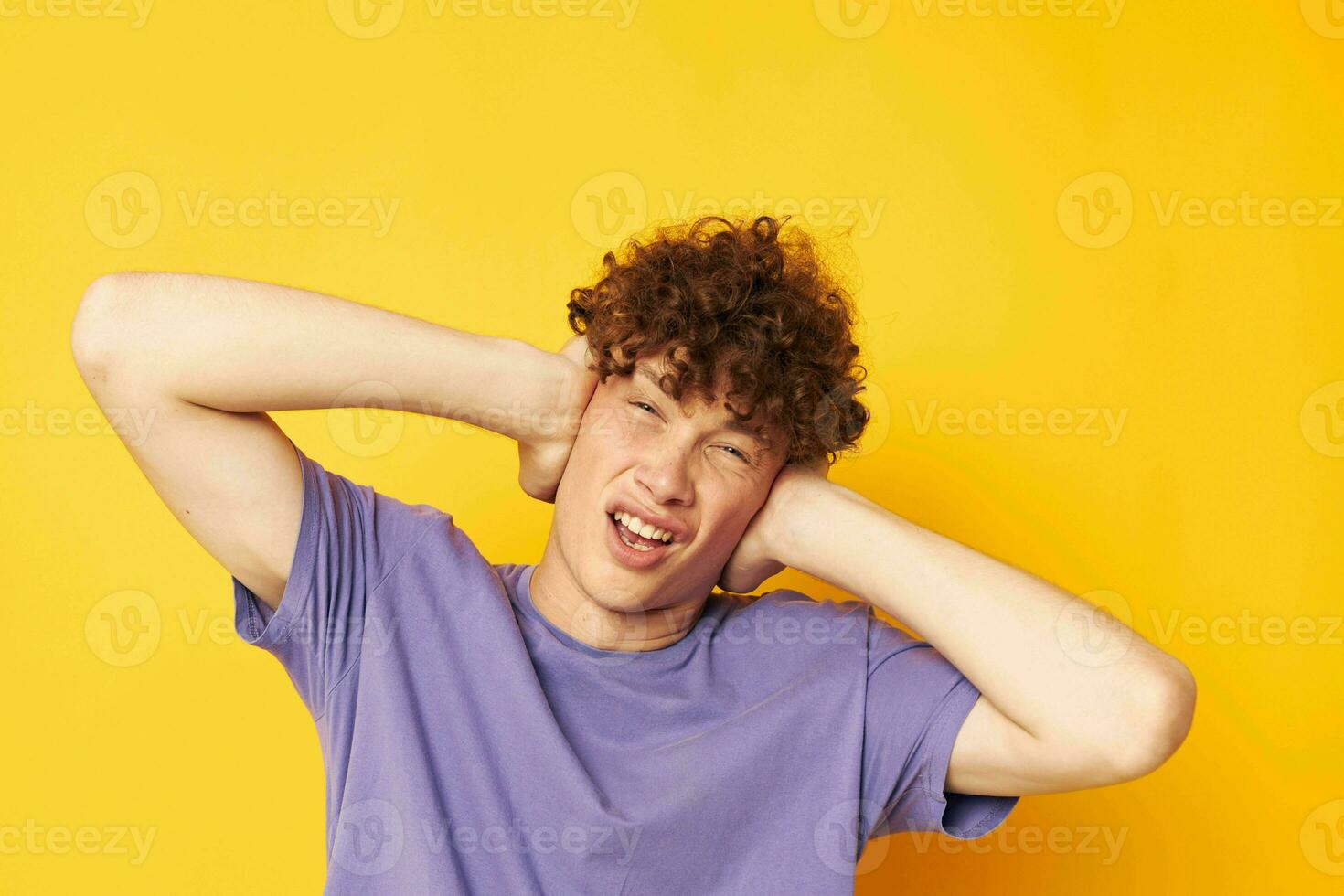 purple t-shirt youth home style emotions yellow background photo