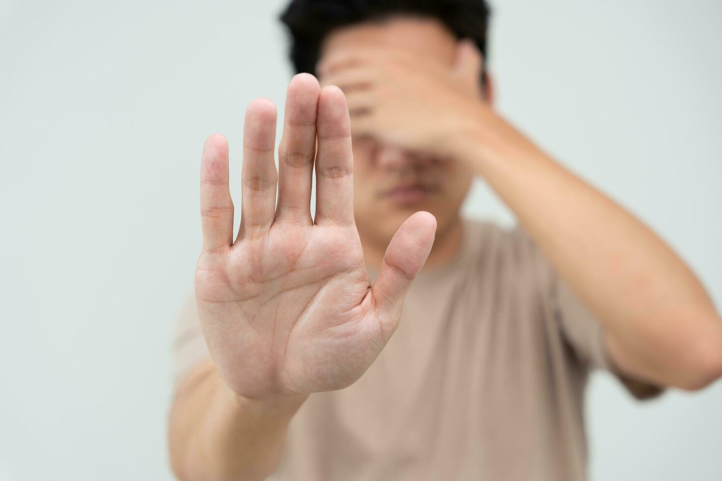 hand showing stop, insult. Pressure, sexism. Racism, stop violence expression with negative, stop taboo sign, rejecting, declining something, campaign against violence against photo