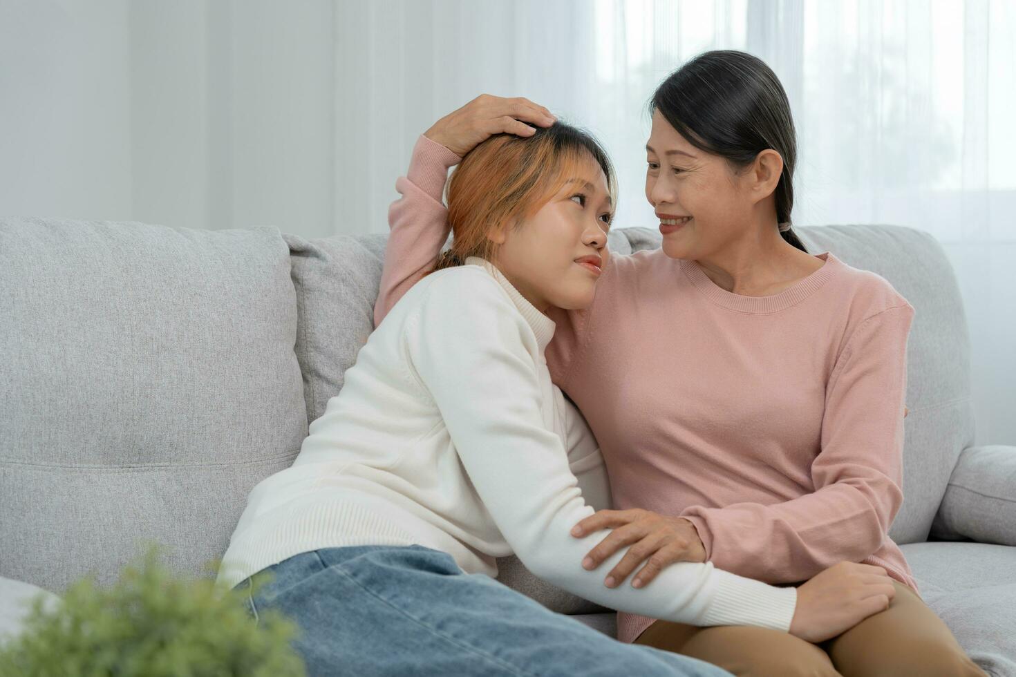 Mother day, cute asian teen girl hugging mature middle age mum. Love, kiss, care, happy smile enjoy family time. celebrate special occasion, happy birthday, merry Christmas. special day photo