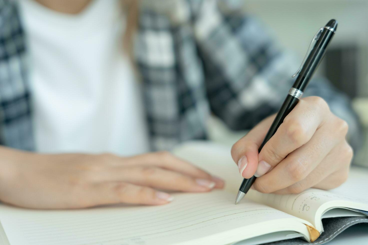Student, use left-handed, inspiration, writer, writing ,creative ,recreation for imagine, writing ideas on notebook, to do list, good thinking work, journalist, Stylish, Dream image, relax, designer photo