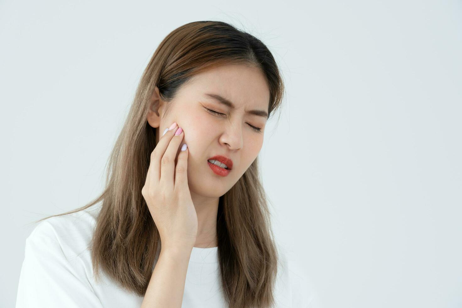 Asian woman feel toothache from gingivitis, female suffer tooth, decay problems, dental care. sensitive tooth, decay problem, bad breath, Gingival Recession, Oral Hygiene instruction, tooth extraction photo