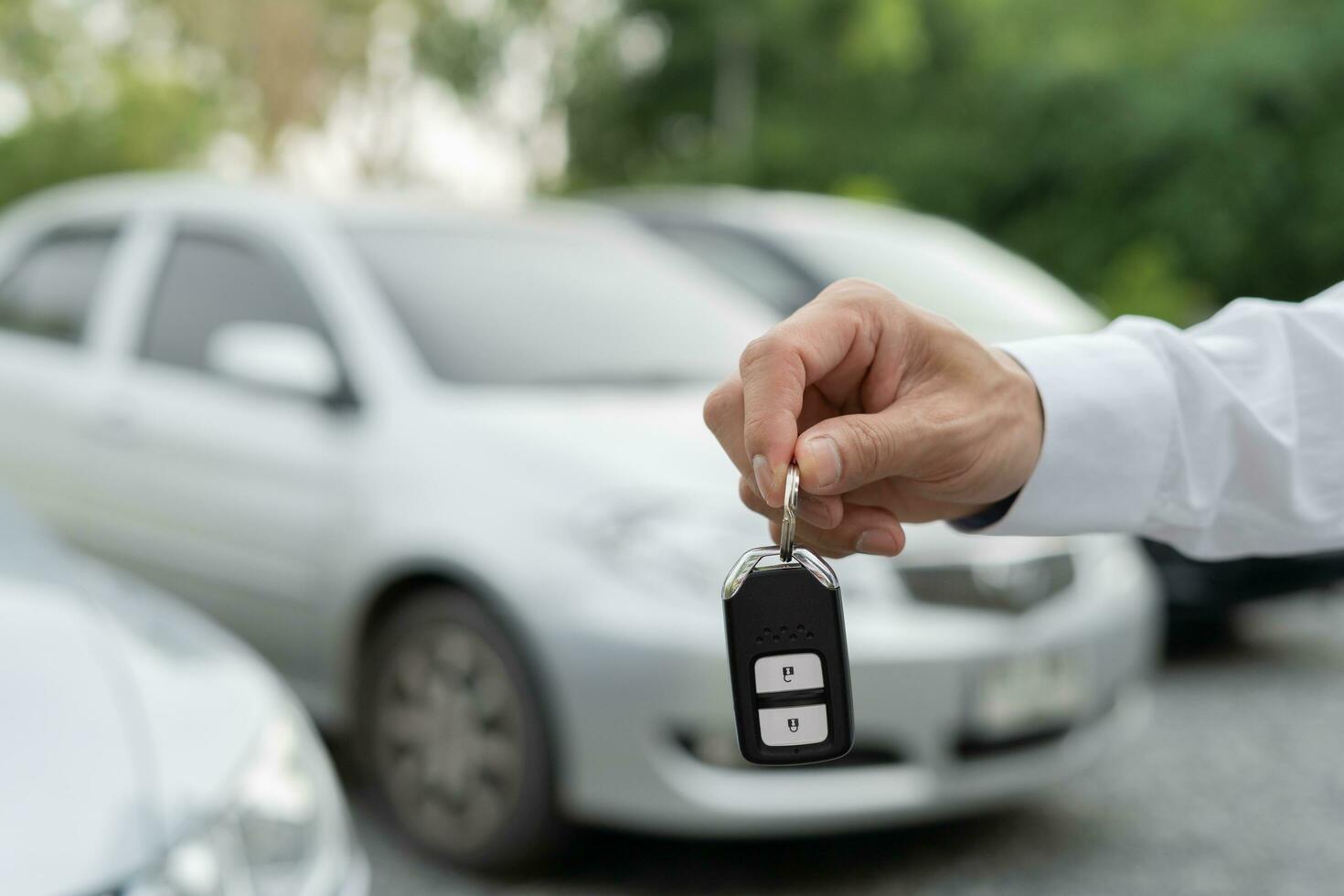 lease, rental car, sell, buy. Dealership manager send car keys to the new owner.  Sales, loan credit financial, rent vehicle, insurance,  renting, Seller, dealer, installment, car care business photo