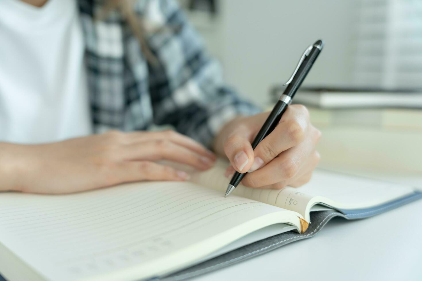Student, use left-handed, inspiration, writer, writing ,creative ,recreation for imagine, writing ideas on notebook, to do list, good thinking work, journalist, Stylish, Dream image, relax, designer photo