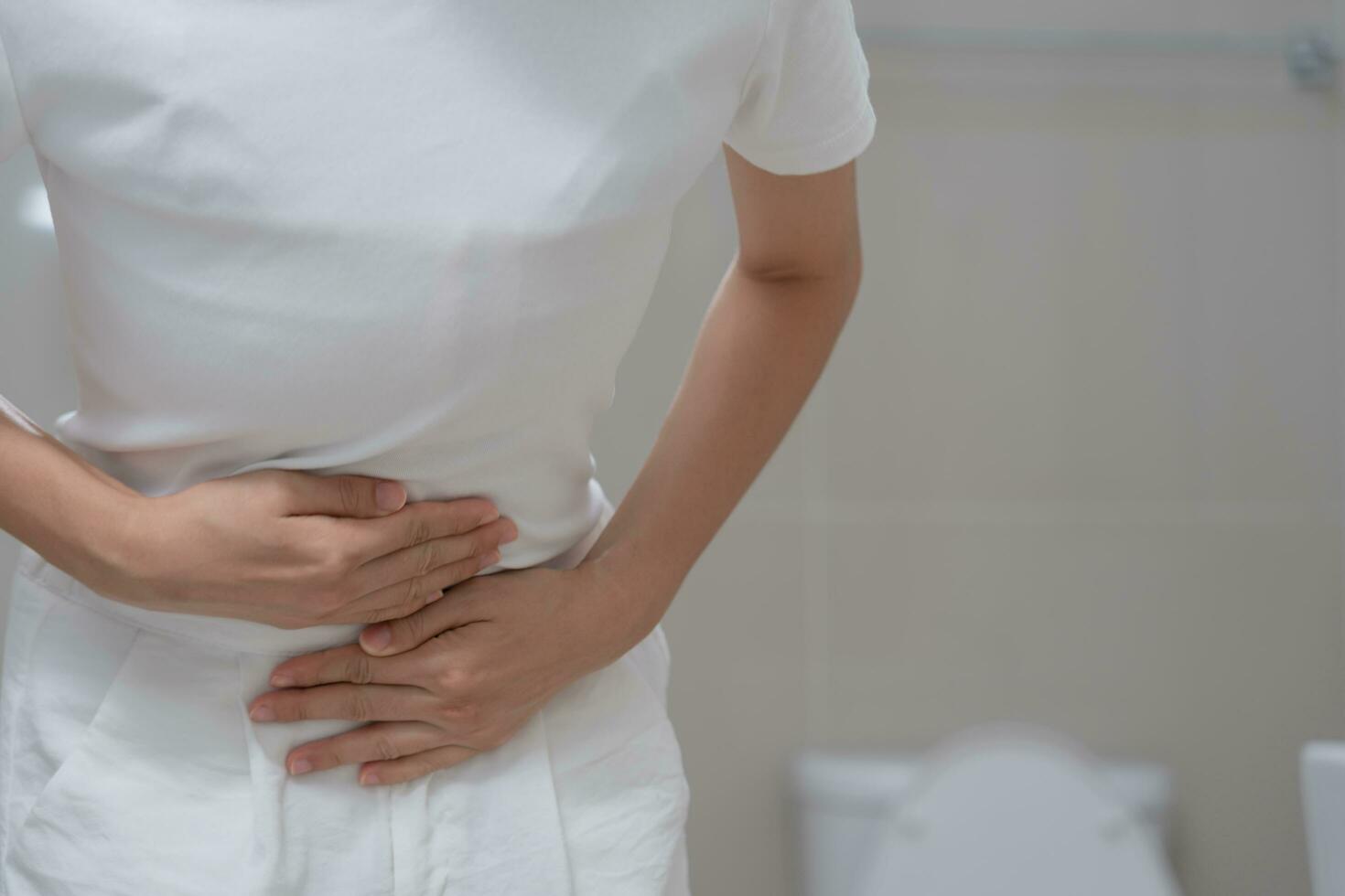 Constipation and diarrhea in bathroom. Hurt man touch belly  stomach ache painful. colon inflammation problem, toxic food, abdominal pain, abdomen, constipated in toilet, stomachache, Hygiene photo