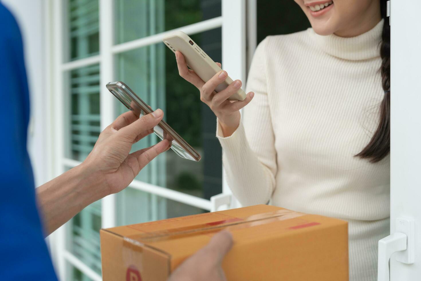 woman use phone to scan barcode or QR codes to pay credit card bill after receiving document invoice online. payment, receive, paying electricity, digital payments, technology, scanning, financial photo