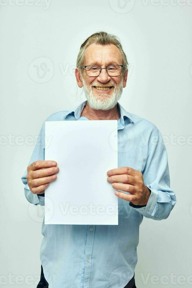 old man office documents work light background photo