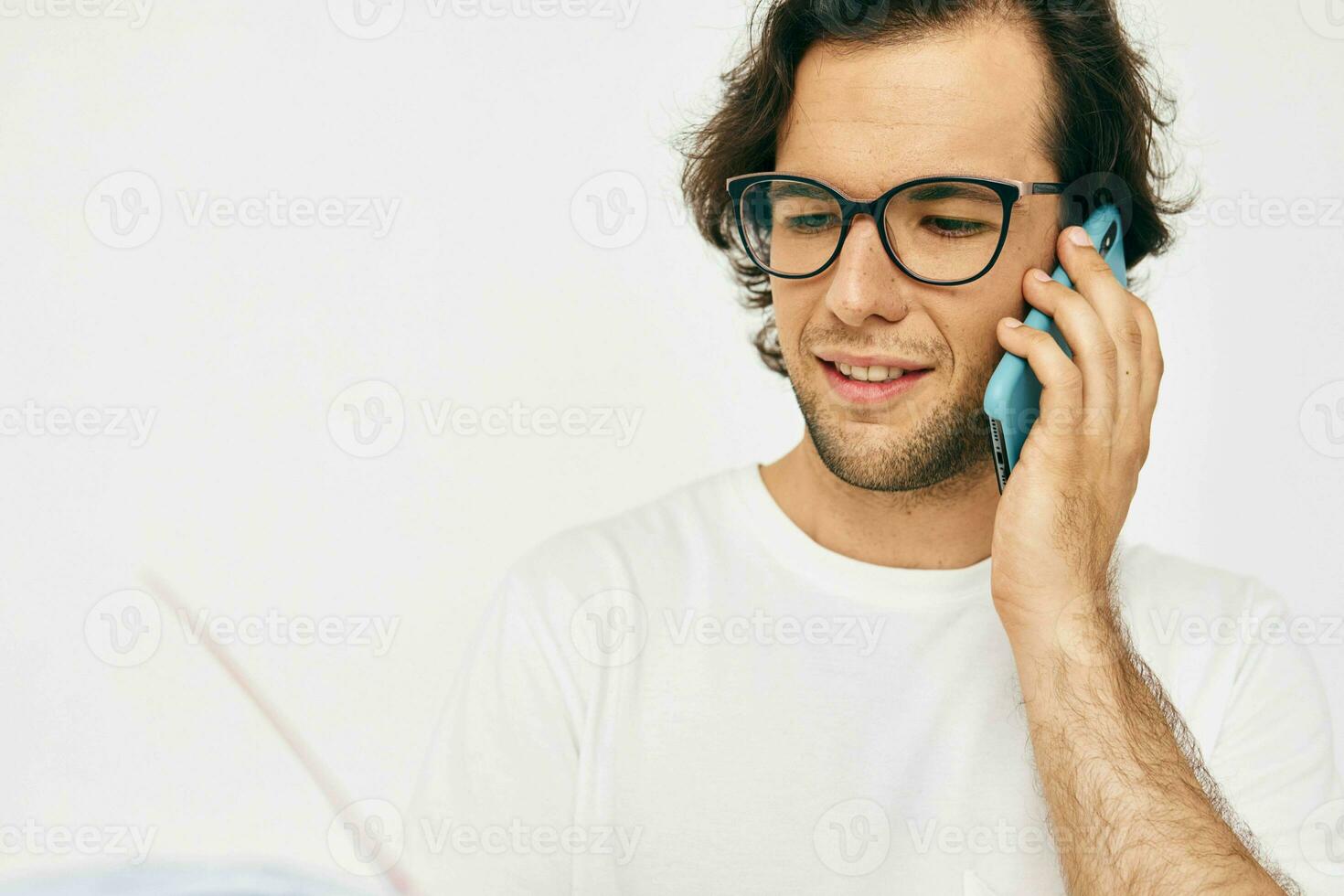 Attractive man red notepad telephone communication Lifestyle unaltered photo