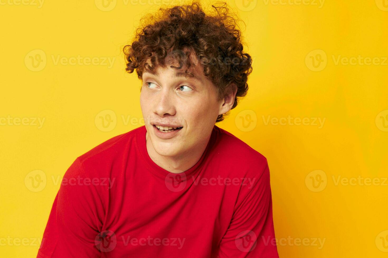 cute red-haired guy red t shirt fun posing casual wear isolated background unaltered photo