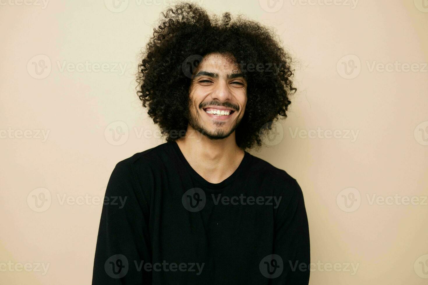 handsome man in a black sweater hand gesture Lifestyle unaltered photo